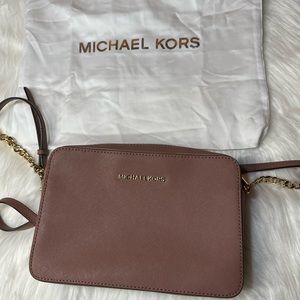 Michael Kors Mauve crossbody bag with gold accents
